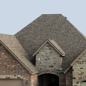 House with a new shingle roof and roof vent